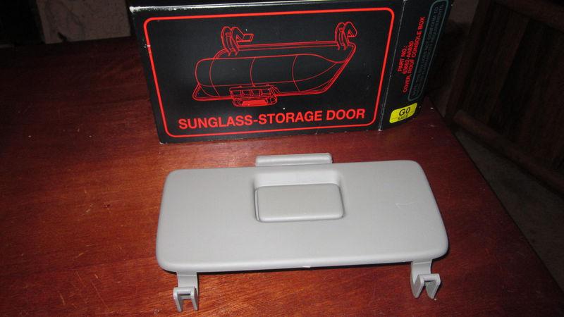 Toyota camry  sunglass storage door new  in box (opened)