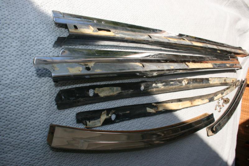 1957 cadillac complete set of window flippers and rear window rail trim