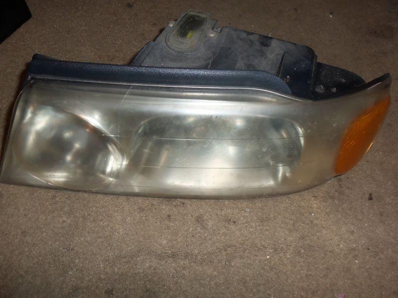 1999 lincoln navigator head light driver left