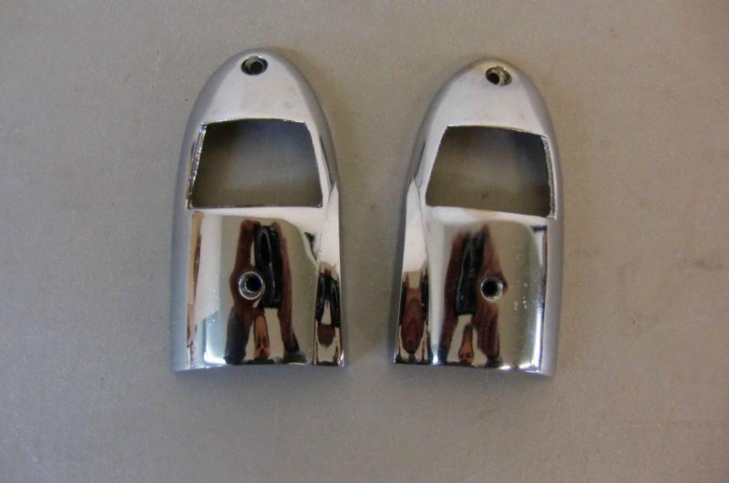 1958 - 1960 corvette rear bumper license plate light bezels pair trim molding 