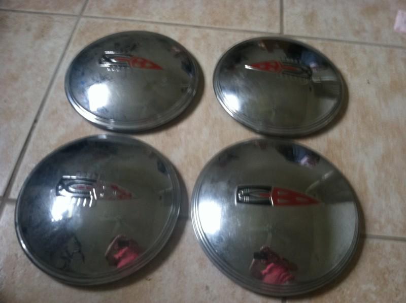Set of 1946 1947 oldsmobile olds hubcaps see photos and read