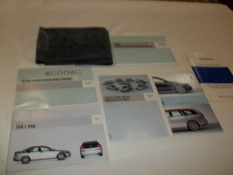 2004 volvo s40 & v40 owner manual 7/pc.set & gray volvo trifold factory case.oem