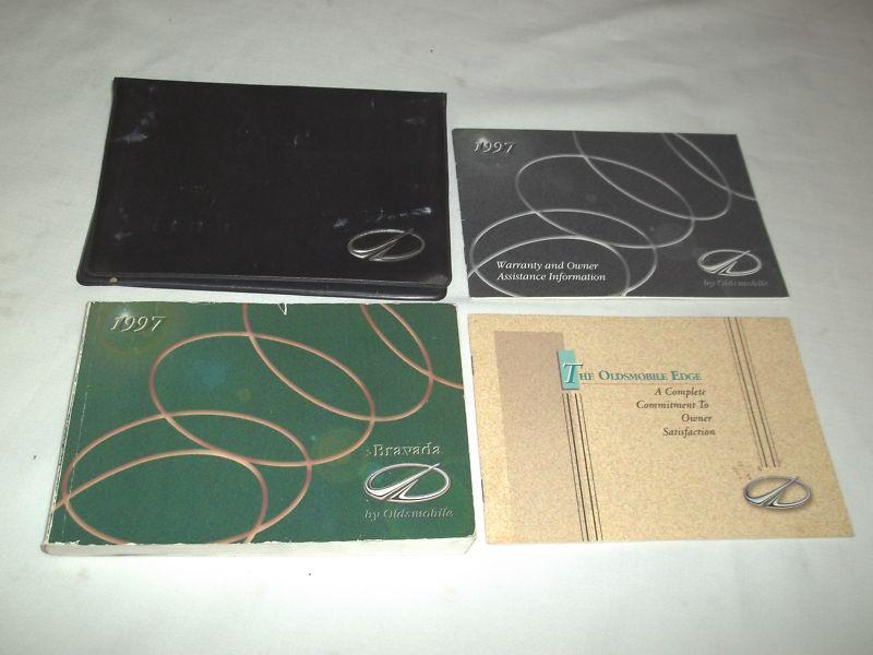 1997 oldsmobile bravada owner' manual 4/pc.set & black oldsmobile factory case.