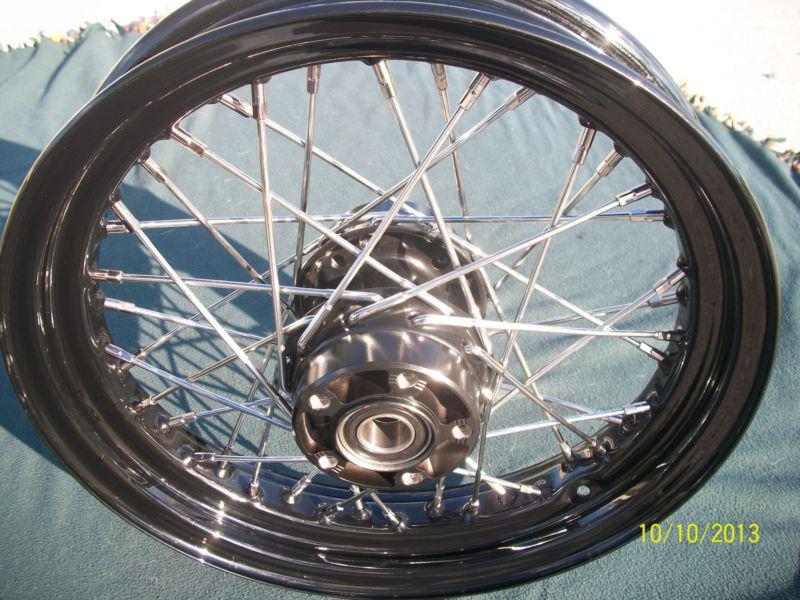 Black and chrome harley 16"  rear wheel 2000-up dyna, softail 