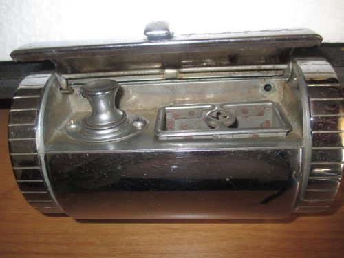 1949 / 1951 frazer rear seat ash receiver with lighter.