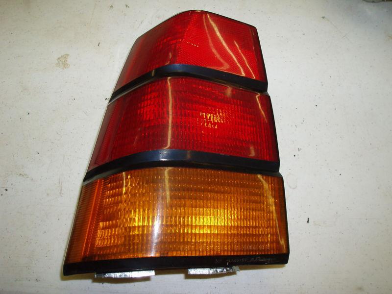 88 89 90 lemans tail light used original left drivers side 