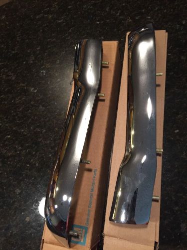 1956 nos chevy fender moldings pair