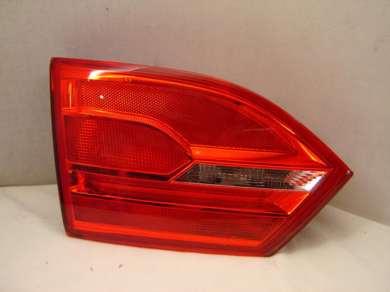 Volkswagen jetta left trunk tail light headlight 11 12 oem 