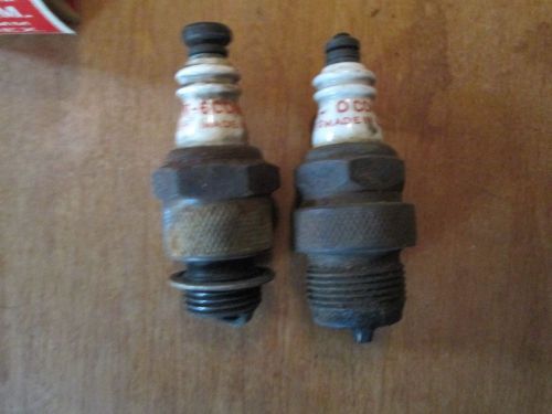 2-vintage champion spark plugs o-com and 6-com