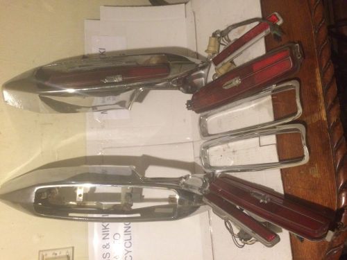 1980-1989 cadillac  brougham rear bumper ends pair with lights