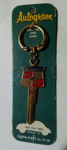 Chevy chevrolet uncut key blank gold enamel badge crest nos 1935 - 1953 signa