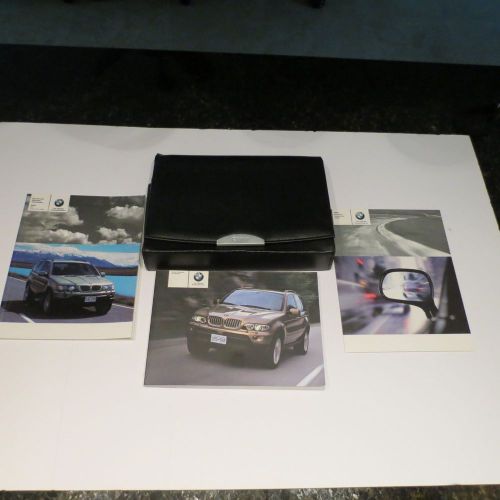 2005 bmw owners owner&#039;s manual set with case oem x5 suv 3.0i,4.4i and 4.8is
