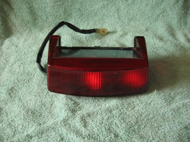 Honda nighthawk cb750 750 rear tail light brake light should fit 1991 thru 2003 