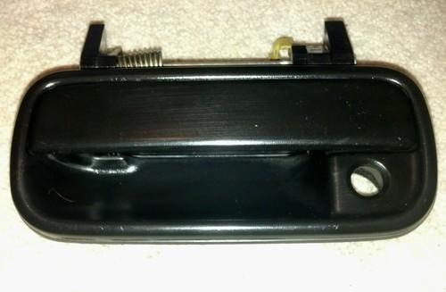 96 97 98 99 00 01 02 toyota 4runner left front door handle black oem with bolts!