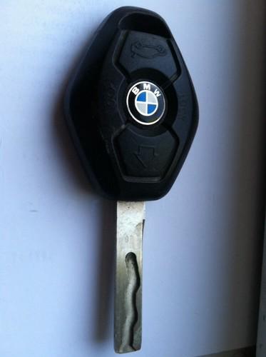 Bmw key fob remote  w/ cut key fcc id: lx8 fzv