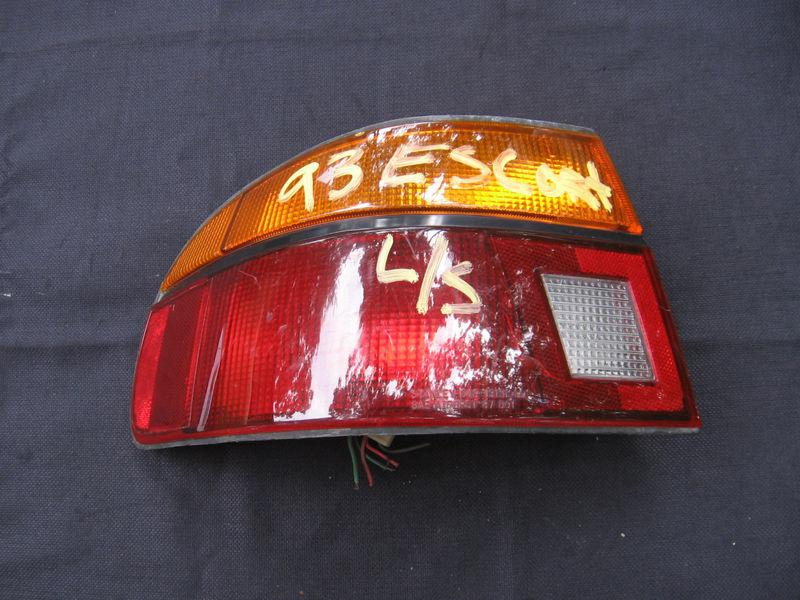 1991-93 ford escort left hand taillight assy.w/sockets, wiring, & light 