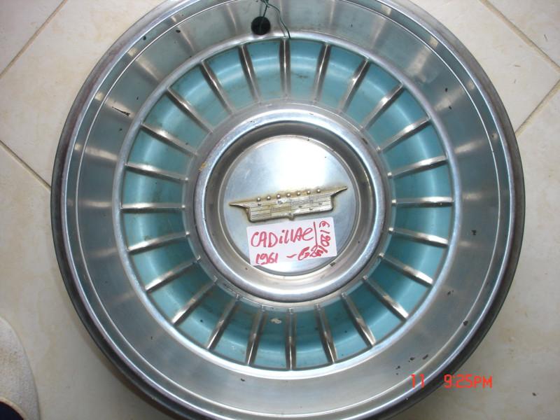 Cadillac wheels 4 hubcaps 1961 1962 center cap 