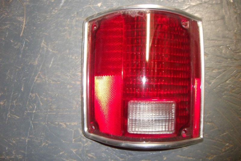 1987-73  chevy chevrolet 1991-73 gmc lh left stop tail turn light lens 1055