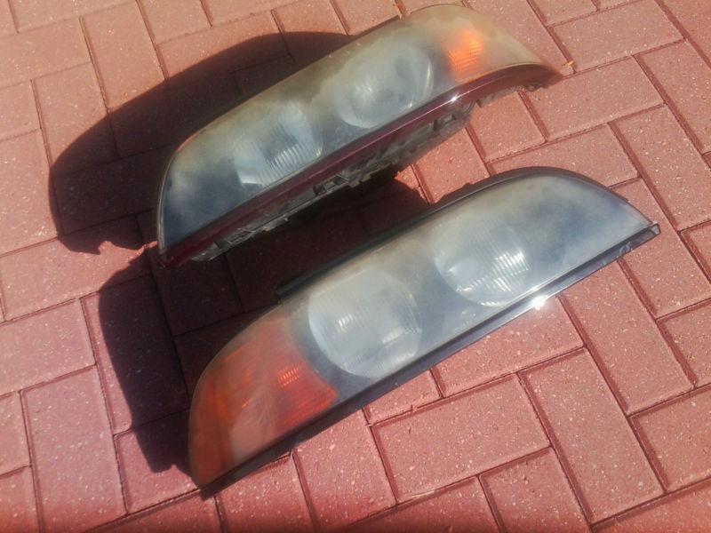 Head lights driver & passenger side 1998 bmw 540i halogen