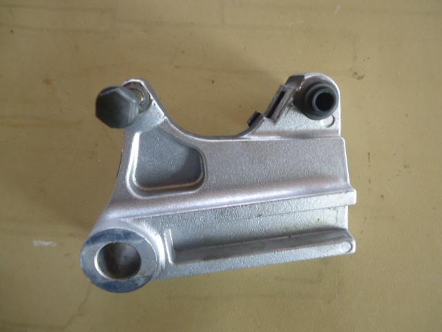 2001 triumph tt 600 rear back wheel brake caliper mounting bracket