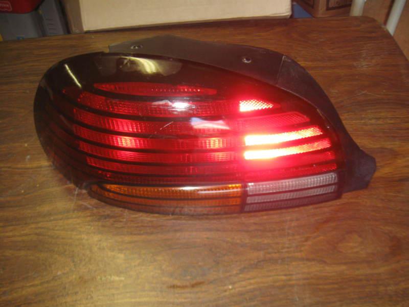 Pontiac grand am tail light driver left lh  96-98 original part