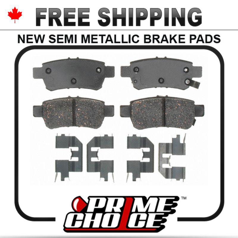 New premium complete set of rear metallic disc brake pads with shims