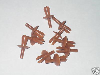 Datsun 240z,260z,280z tan interior plastic rivets - nos