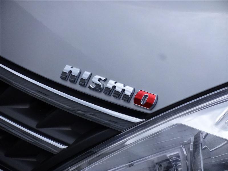 New oem 2014 juke nismo emblem on rear gate / hatch "nismo" w red "o"