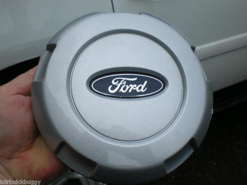 2004-2008 ford f-150 silver oem center cap p/n  4l34-1a096-ac