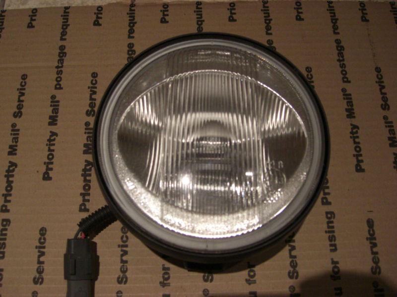 01 02 03 mazda protege fog light driver or passenger side factory oem