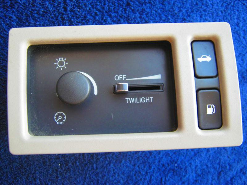  cadillac deville headlight switch w/ trunk and gas door button tan