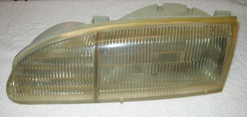 Ford thunderbird headlight driver side 1995