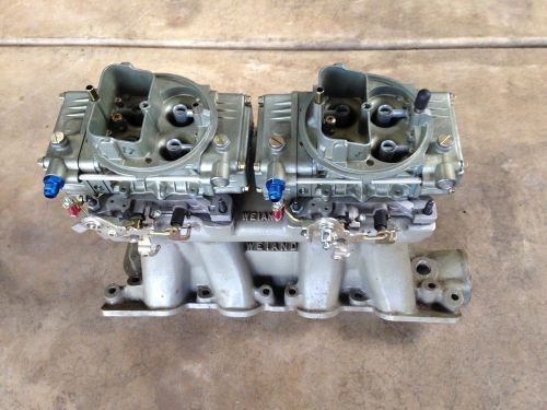 Weiand dual quad for boss 302 ford  with two 450 cfm holley carbs