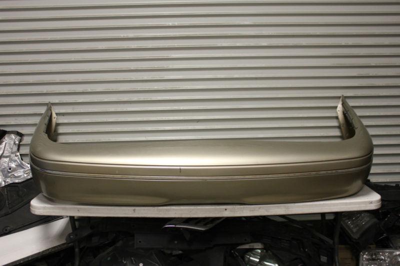 1998-2011 ford crown victoria oem factory rear bumper cover gold chrome strip 