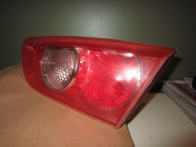 2008  2010 mitsubishi lancer trunklid inner rh right taillight oem, used good