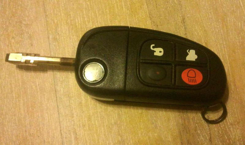 Used oem jaguar flip key keyless remote fob nhvwb1u241