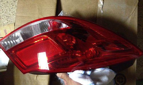 2012 oem buick regal tail lamp driver side. brand new.