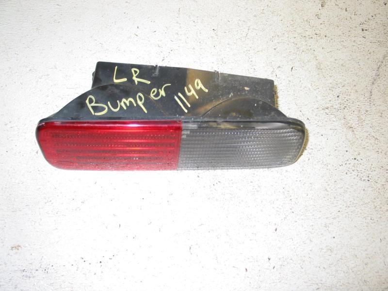 02 03 04 land rover discovery left tail light bumper mounted  28994