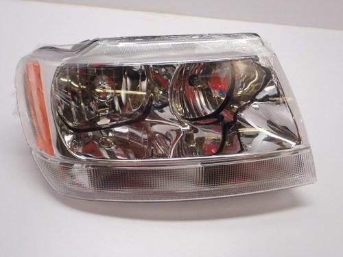 Tyc 20-5575-90 jeep grand cherokee passenger side headlight assembly