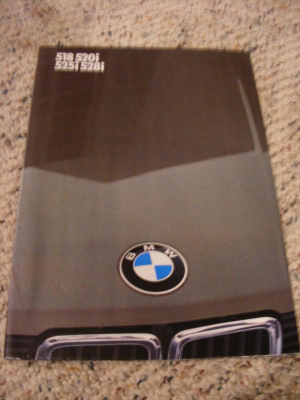 1982 bmw 5-series brochure/poster.  16pages, folds out to full poster, german