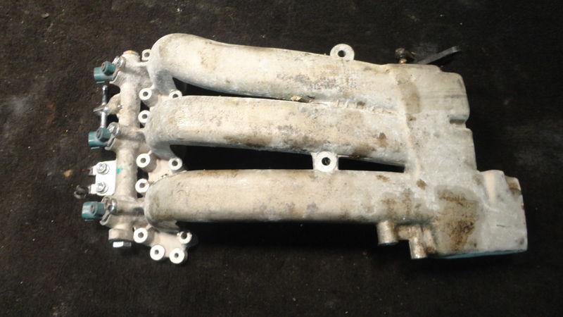 Used intake manifold #5030674 for 1999 70hp evinrude outboard motor ~e70pl4ee~