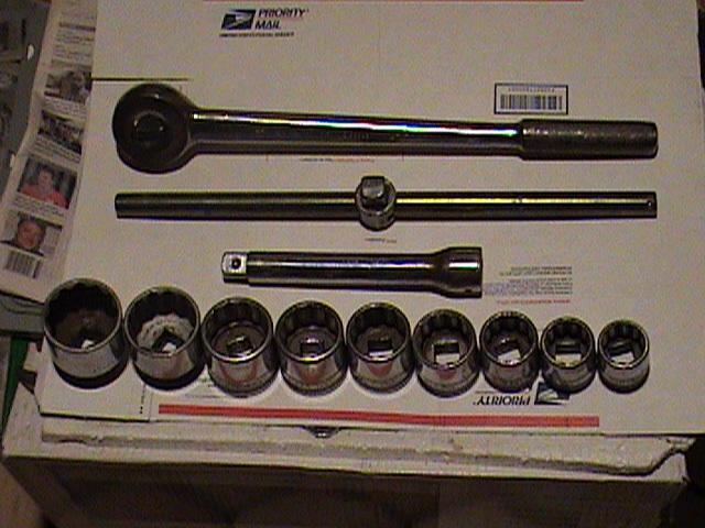 S-k  us 12 piece, ratchet & sockets, wright t-wrench, armstrong ext.,  & napa