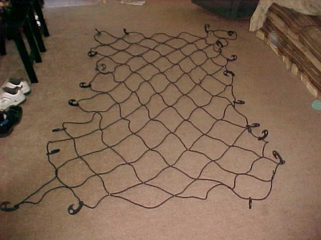 Will strech out to72" x 96" full size elastic pickup cargo net with 20 hooks!