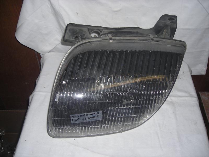 1995-2002 pontiac sunfire lh headlight