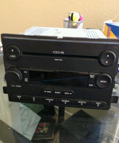 2005 ford f-150 stock stereo used mp3 aux 6 cd changer working in good condition