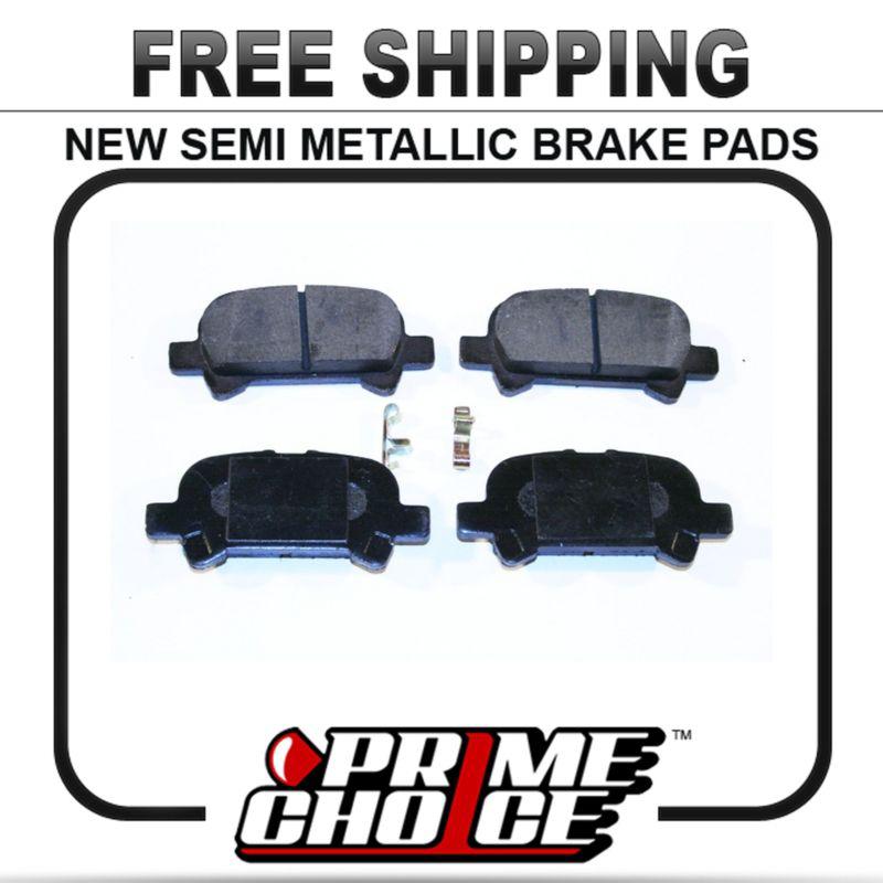 New premium complete set of rear metallic disc brake pads with shims