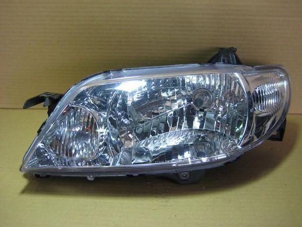 Mazda familia 2001 left head light assembly [8410900]