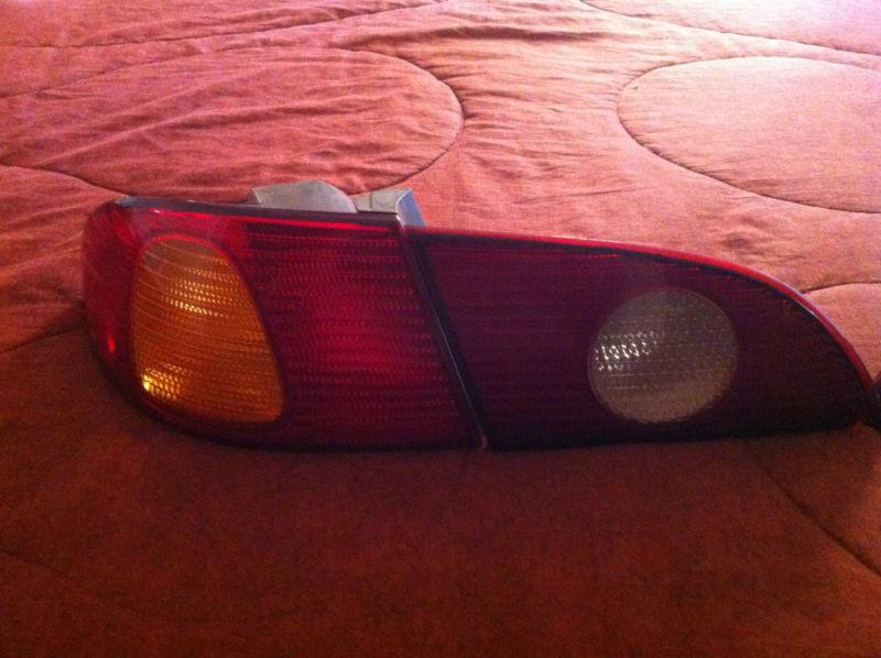 2002 toyota corolla tail light  set of  all  4 (oem) 