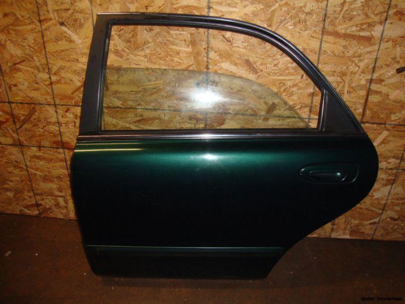 98 99 00 01 02 mazda 626 driver side rear door 4 door sedan oem