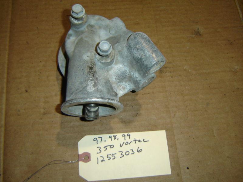 350 chevy vortec oil filter housing with mounting bolts casting # 12553036